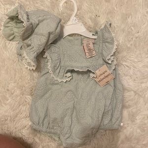 NWT beautiful blue we forgot to wear. Comes with a bonnet!